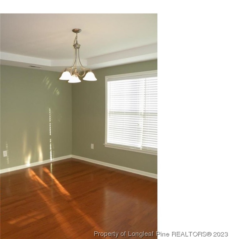 93 Expedition Drive Cameron, NC 28326 - Photo 6 of 19 a view of a livingroom with a chandelier