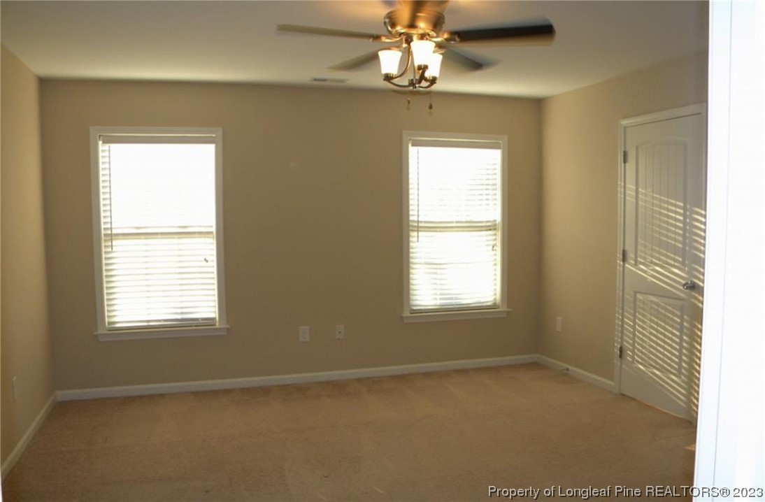 93 Expedition Drive Cameron, NC 28326 - Photo 9 of 19 a view of an empty room with a window