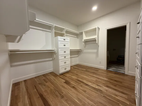 a view of an empty walk in closet