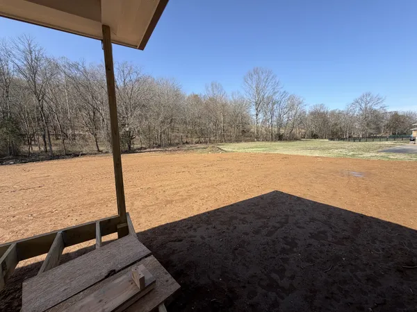 a view of an ocean with a mountain