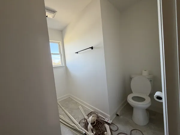 a bathroom with a toilet