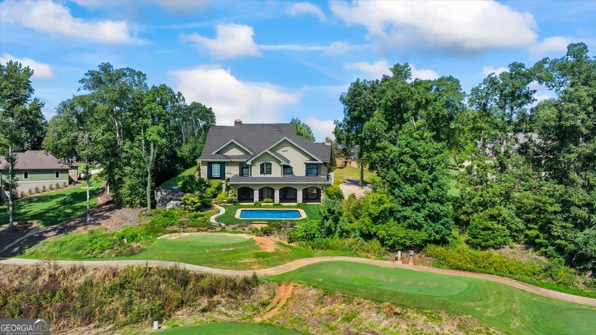 105 Birch Circle Forsyth, GA 31029 - Photo 12 of 12 a front view of a house with a yard