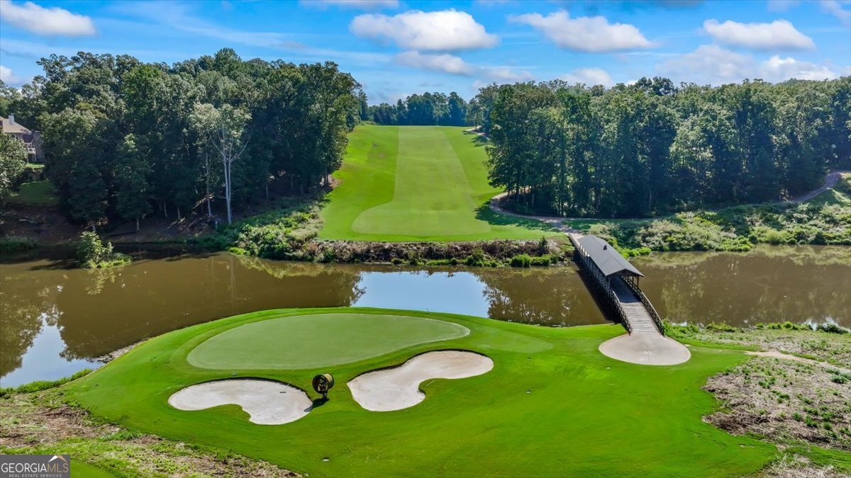 105 Birch Circle Forsyth, GA 31029 - Photo 2 of 12 an aerial view of a golf course with chairs