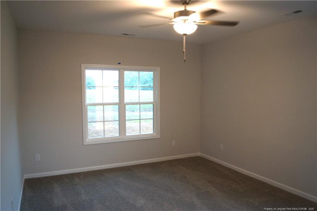 123 Nectar Lane Bunnlevel, NC 28323 - Photo 20 of 36 an empty room with a window