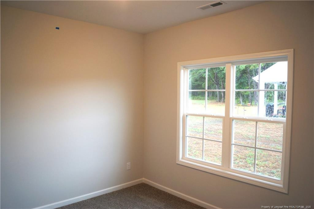 123 Nectar Lane Bunnlevel, NC 28323 - Photo 25 of 36 an empty room with a window
