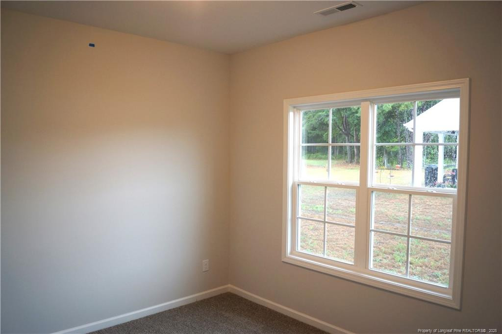 123 Nectar Lane Bunnlevel, NC 28323 - Photo 29 of 36 an empty room with a window