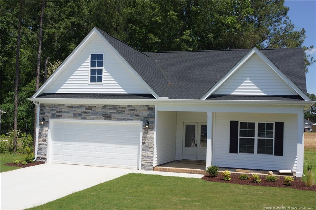123 Nectar Lane Bunnlevel, NC 28323 - Photo 33 of 36 a view of front door of house