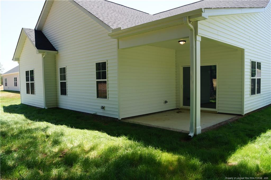 123 Nectar Lane Bunnlevel, NC 28323 - Photo 34 of 36 a view of a back yard of the house