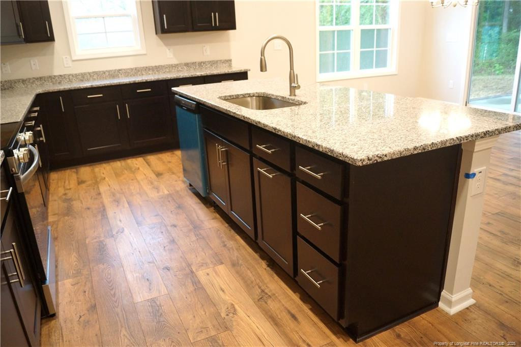 123 Nectar Lane Bunnlevel, NC 28323 - Photo 8 of 36 a bathroom with a sink and a mirror