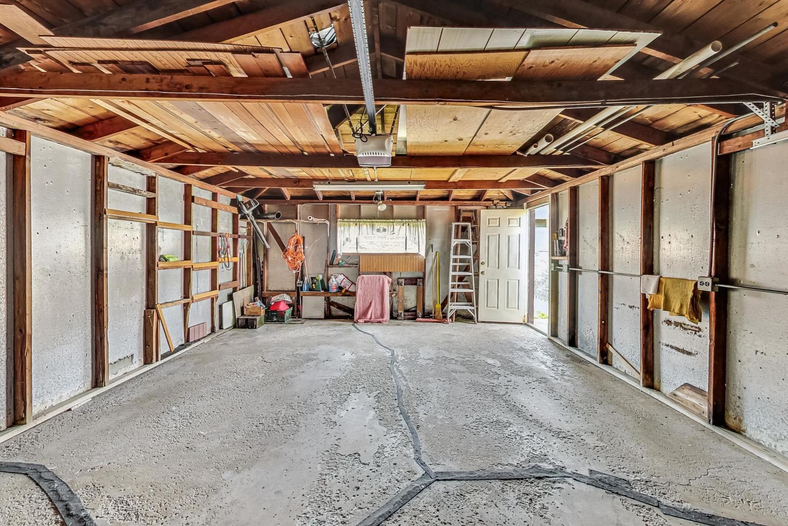 6241 South Rutherford Avenue Chicago, IL 60638 - Photo 35 of 39 a view of empty room with wooden walls