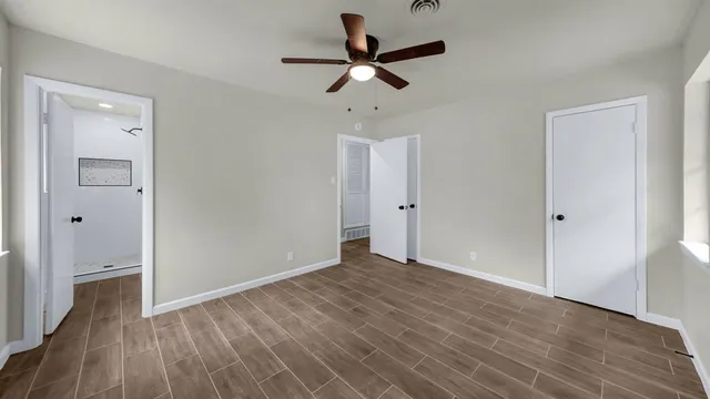 a bathroom with a sink toilet a mirror and shower