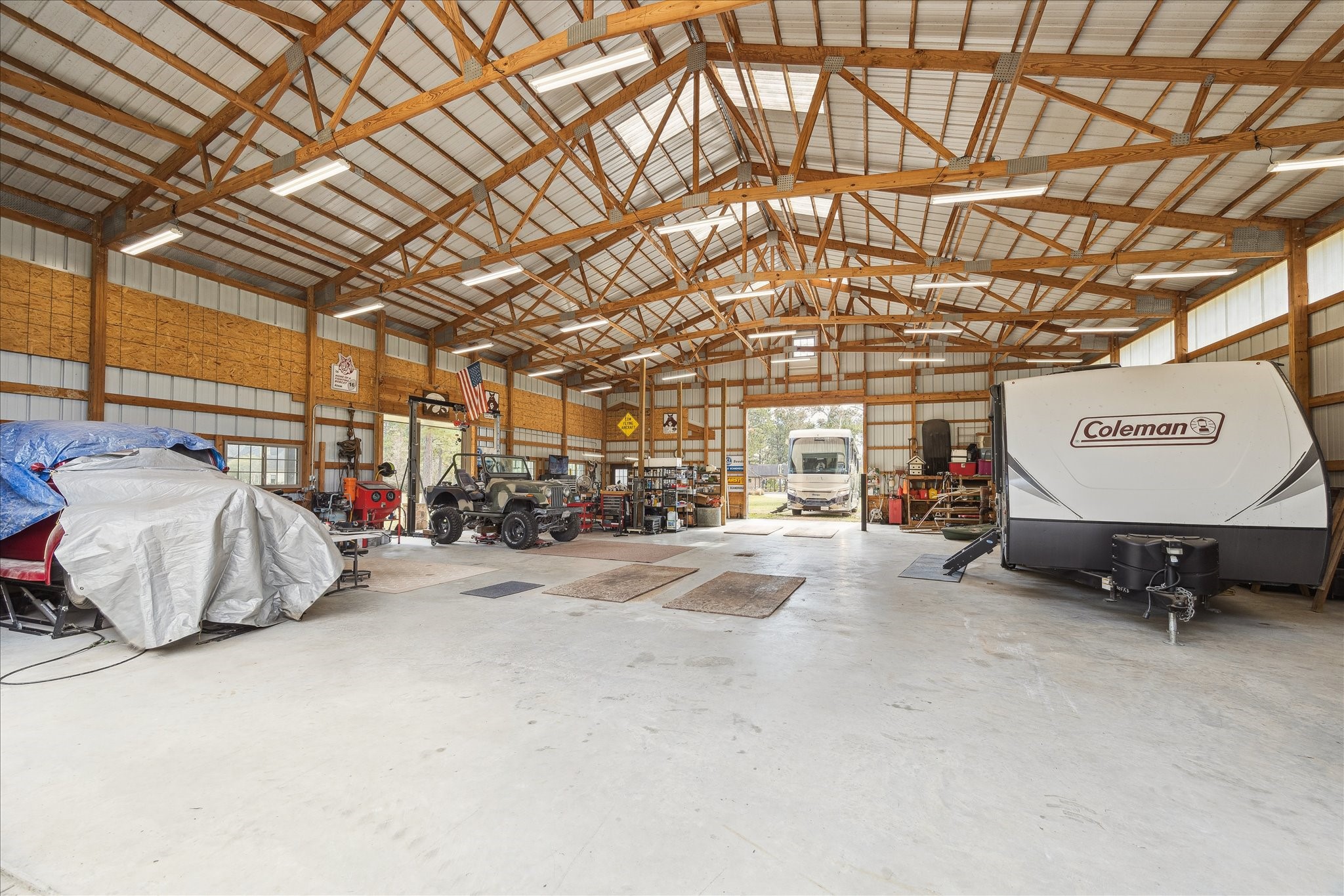 11 Willowcreek Ranch Road Tomball, TX 77377 - Photo 11 of 49 Endless storage when the RV is removed! The barn could also be equipped with a loft or modified into an equestrian barn. The barn is equipped with electrical as well as serviced by the well water.