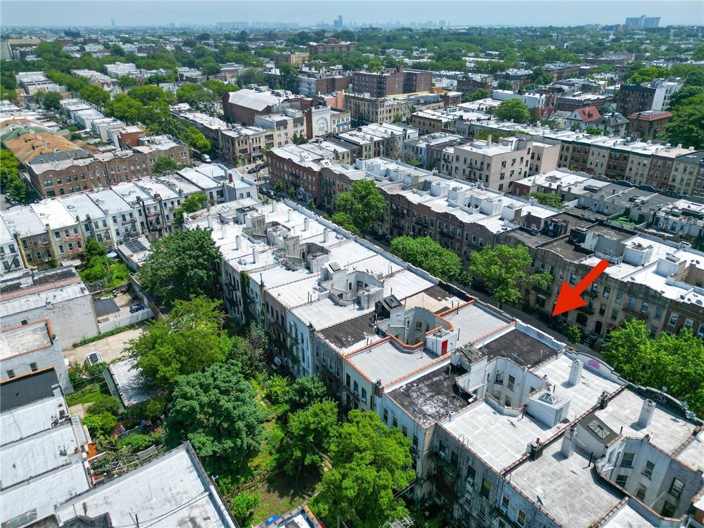 441 68th Street Brooklyn, NY 11220 - Photo 11 of 15 an aerial view of a city with lots of residential buildings