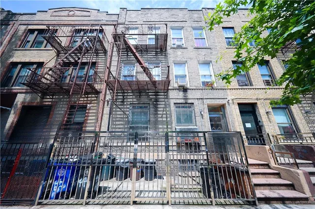 an aerial view of a multi story residential apartment building