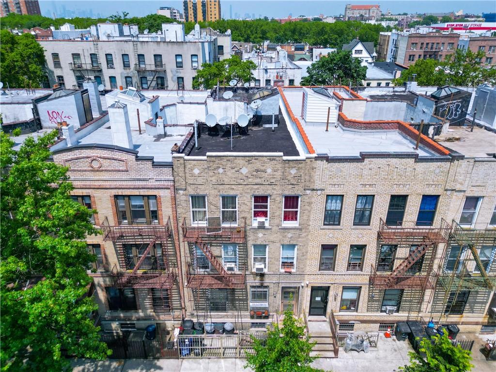 441 68th Street Brooklyn, NY 11220 - Photo 6 of 15 a picture of a city with tall buildings