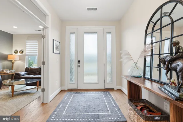 a view of livingroom with furniture and workspace