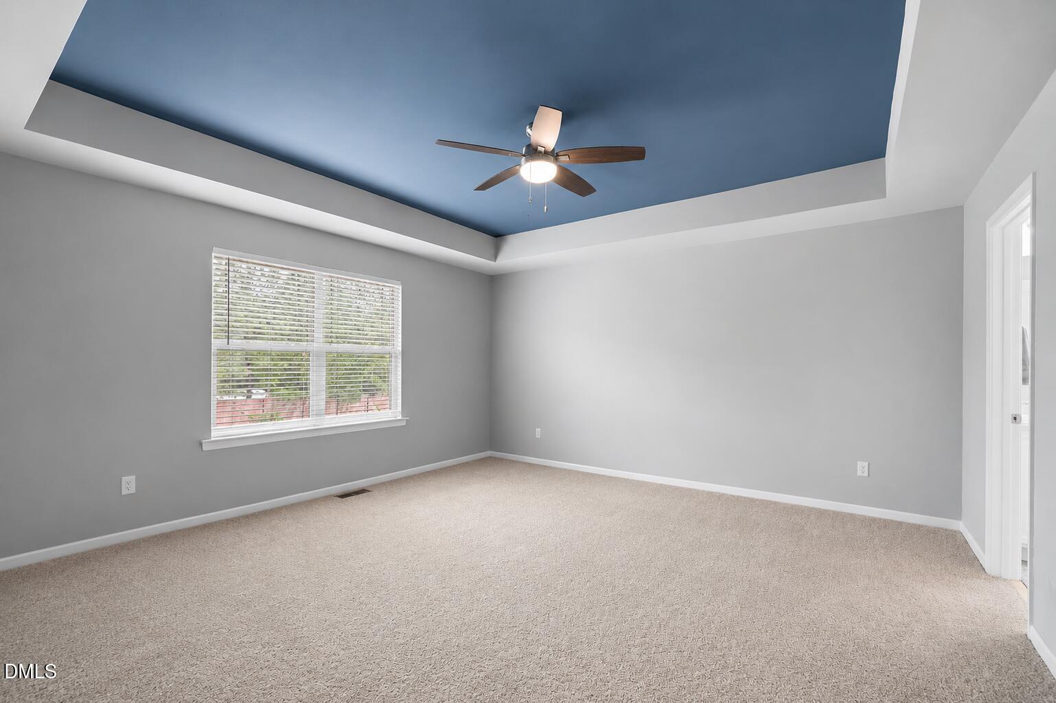 364 Springtime Fields Lane Wake Forest, NC 27587 - Photo 31 of 63 an empty room with a window and a fan