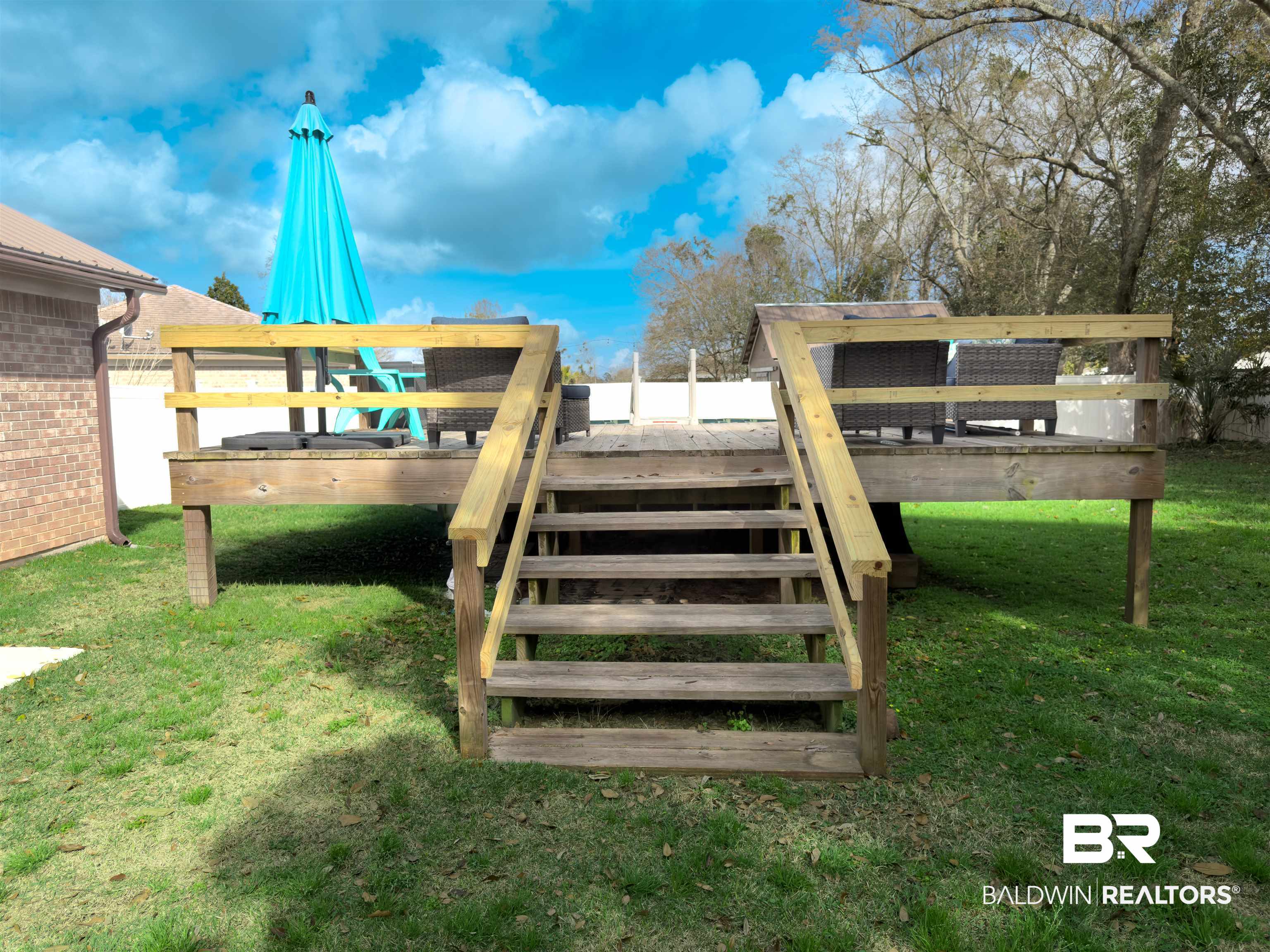 129 Pennbrooke Loop Foley, AL 36535 - Photo 36 of 44 Wooden deck featuring a lawn and stairs