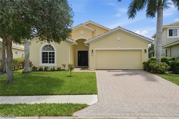 front view of a house with a yard