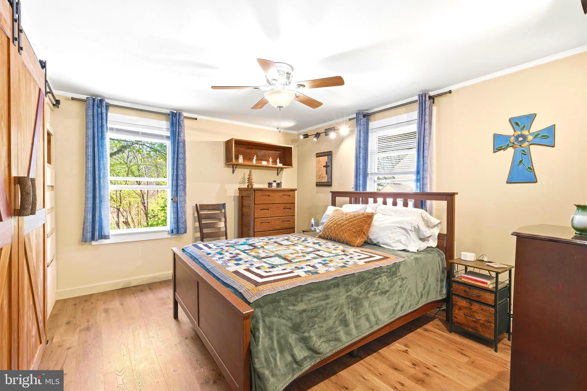 765 Old Manchester Road Westminster, MD 21157 - Photo 12 of 43 a bed sitting in a bedroom next to a window