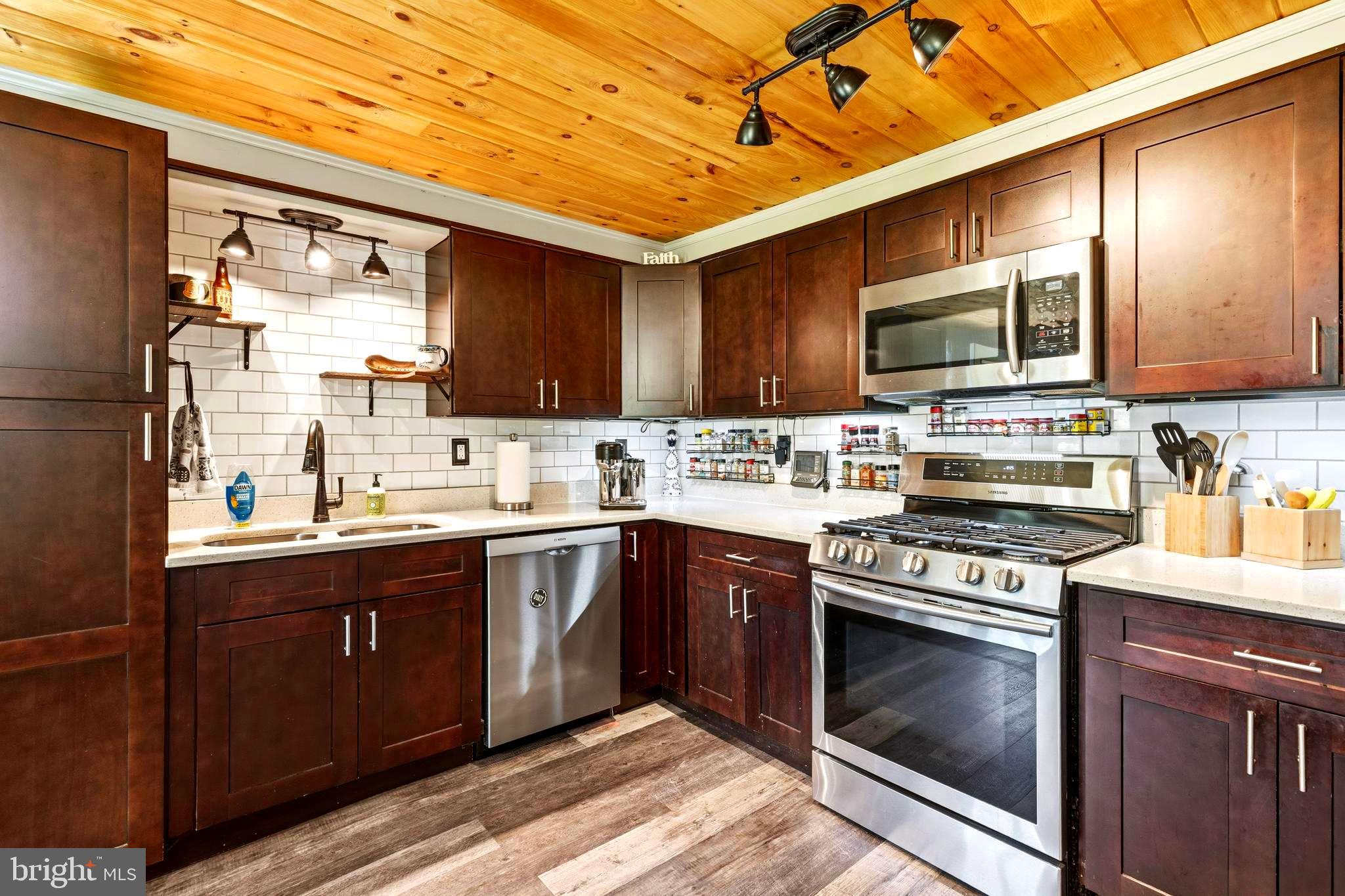 765 Old Manchester Road Westminster, MD 21157 - Photo 10 of 43 a kitchen with a stove sink and microwave