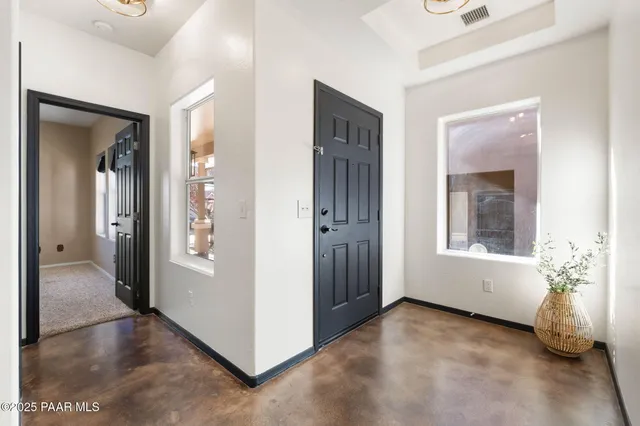 a view of livingroom with hardwood floor and a window