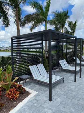 a view of a garden with an outdoor space