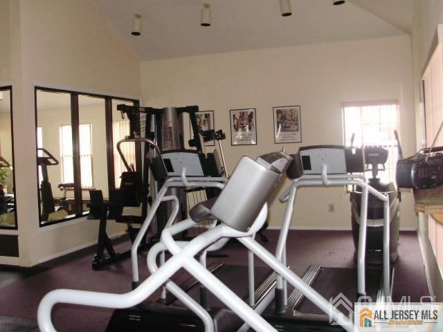 1511 Pebble Place, Unit 1511 Sayreville, NJ 08859 - Photo 24 of 26 a view of a room with gym equipment