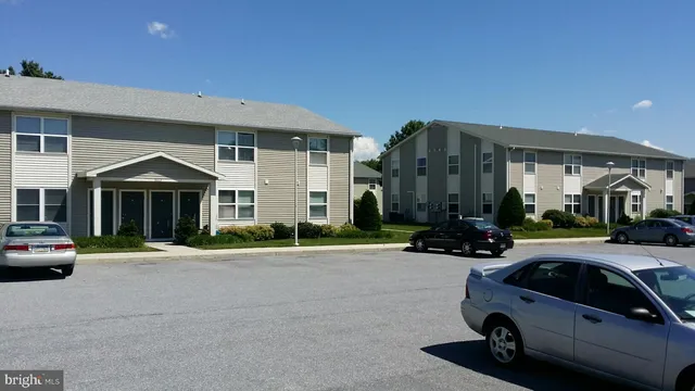 a car parked in front of a house