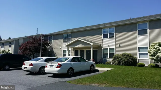 a car parked in front of a house
