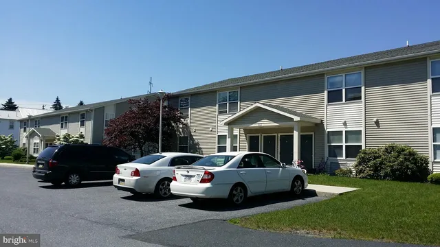 a car parked in front of a house