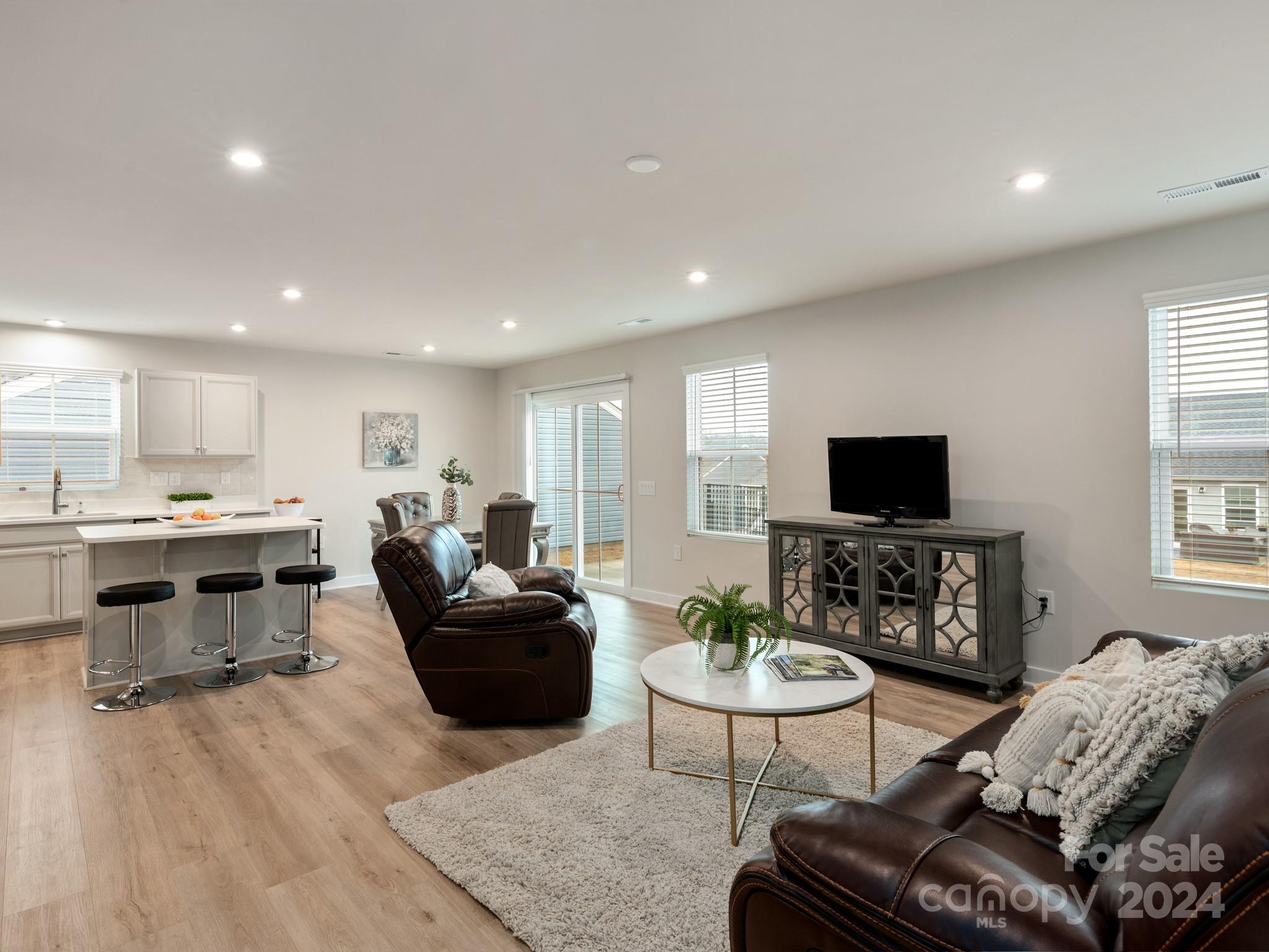 309 Damask Drive Lancaster, SC 29720 - Photo 11 of 28 a living room with furniture flat screen tv and window