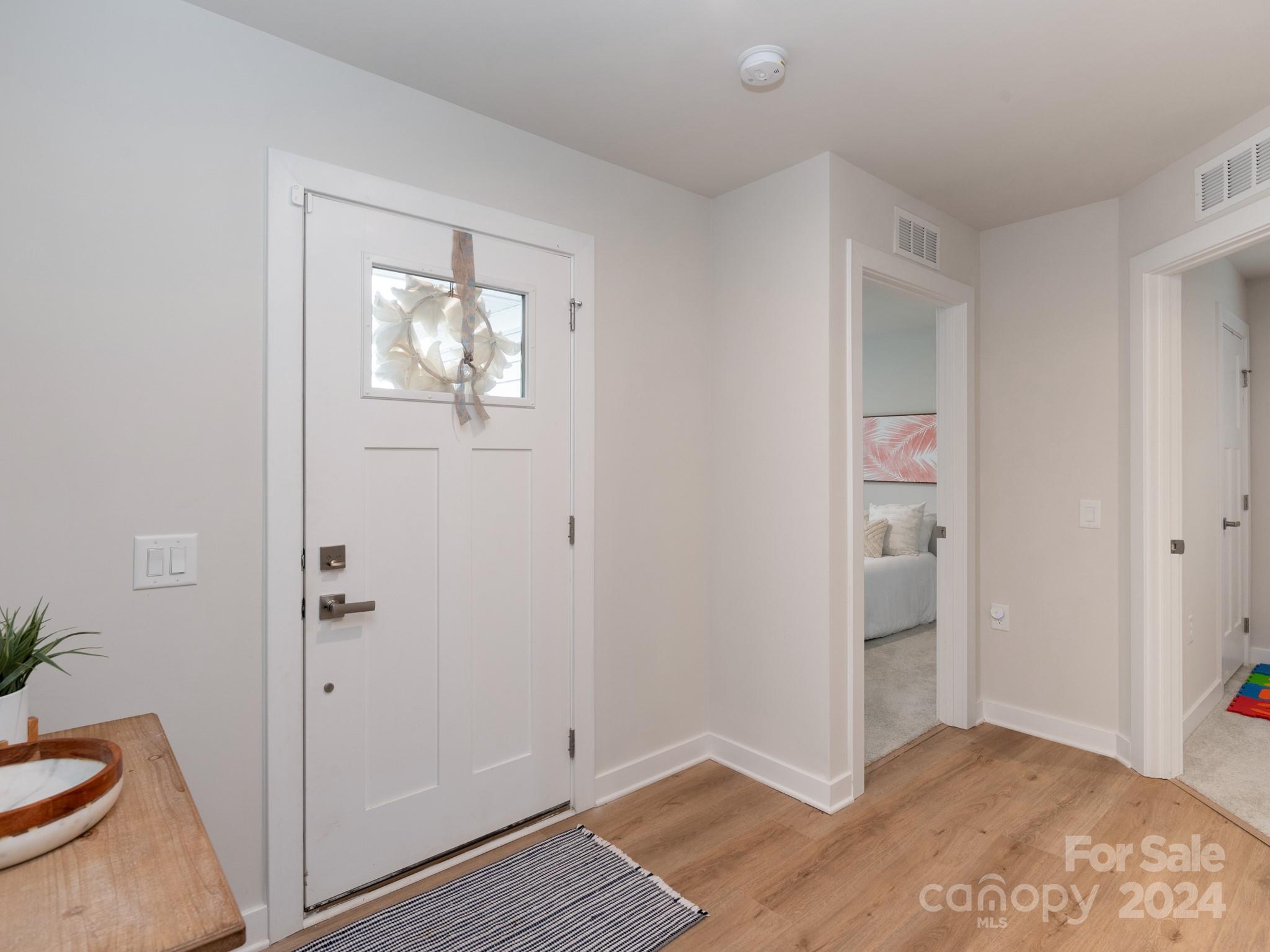 309 Damask Drive Lancaster, SC 29720 - Photo 19 of 28 a view of livingroom with hardwood floor and tub