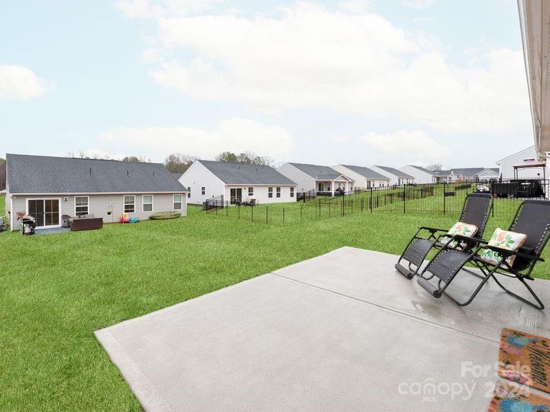 309 Damask Drive Lancaster, SC 29720 - Photo 25 of 28 a view of a house with garden and a sitting area