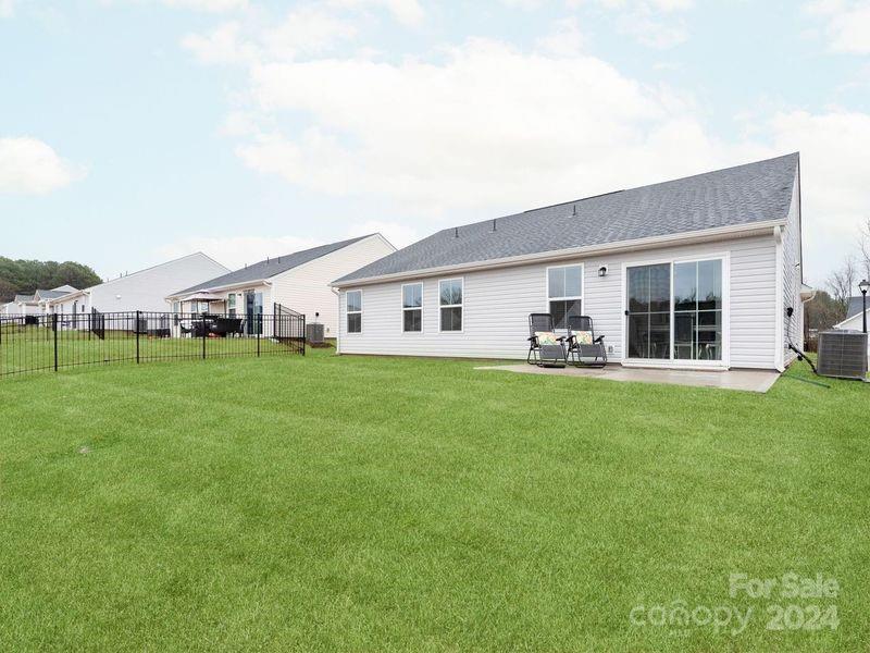 309 Damask Drive Lancaster, SC 29720 - Photo 27 of 28 a view of a house with a backyard