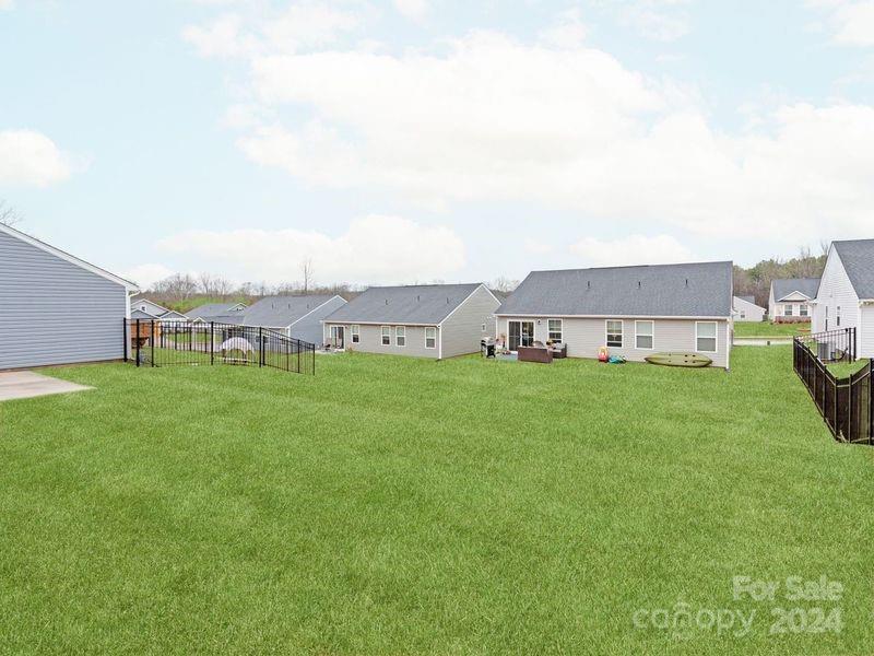 309 Damask Drive Lancaster, SC 29720 - Photo 28 of 28 a view of an house with backyard space and porch