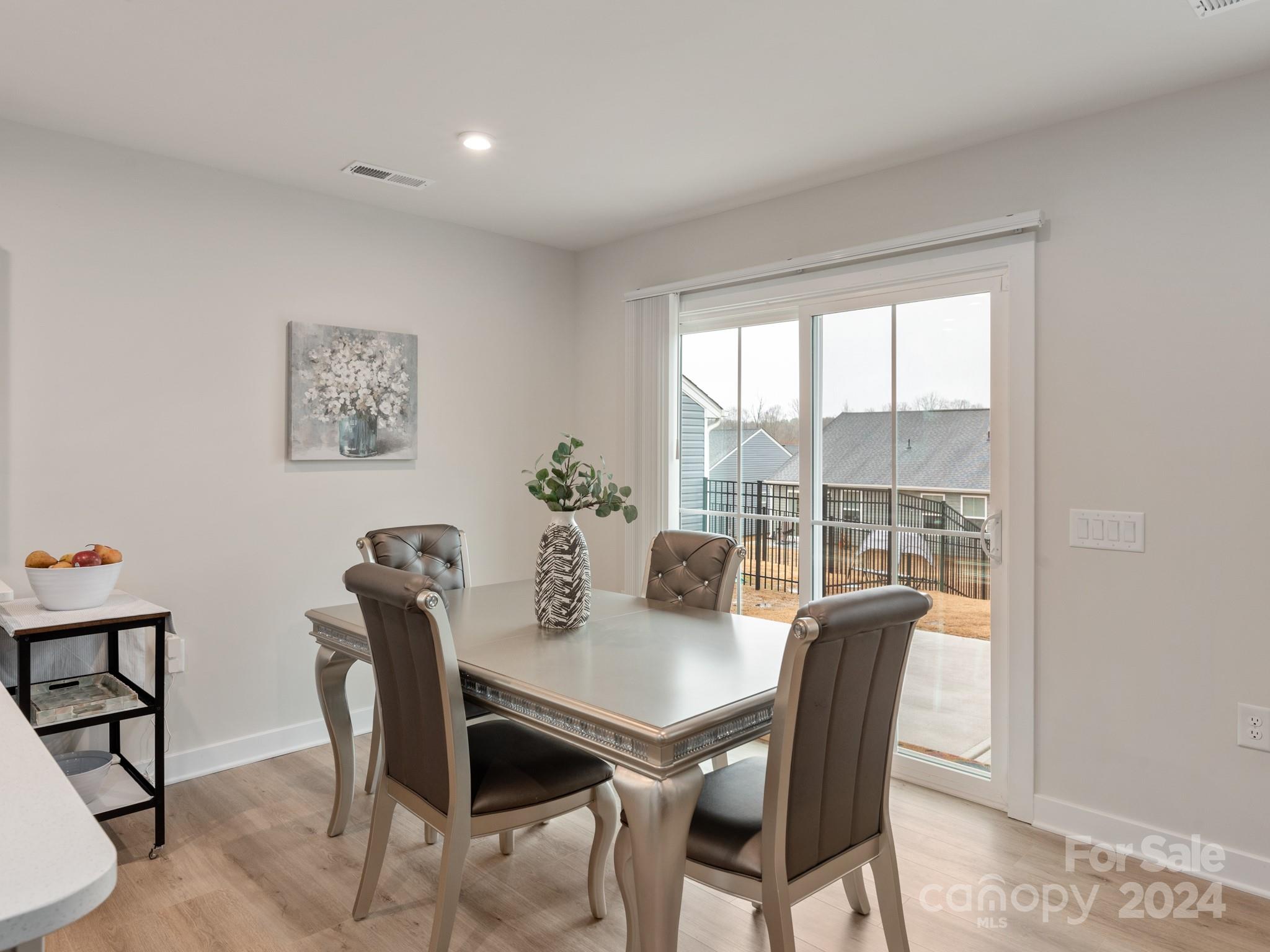 309 Damask Drive Lancaster, SC 29720 - Photo 7 of 28 a view of a dining room with furniture window and outside view