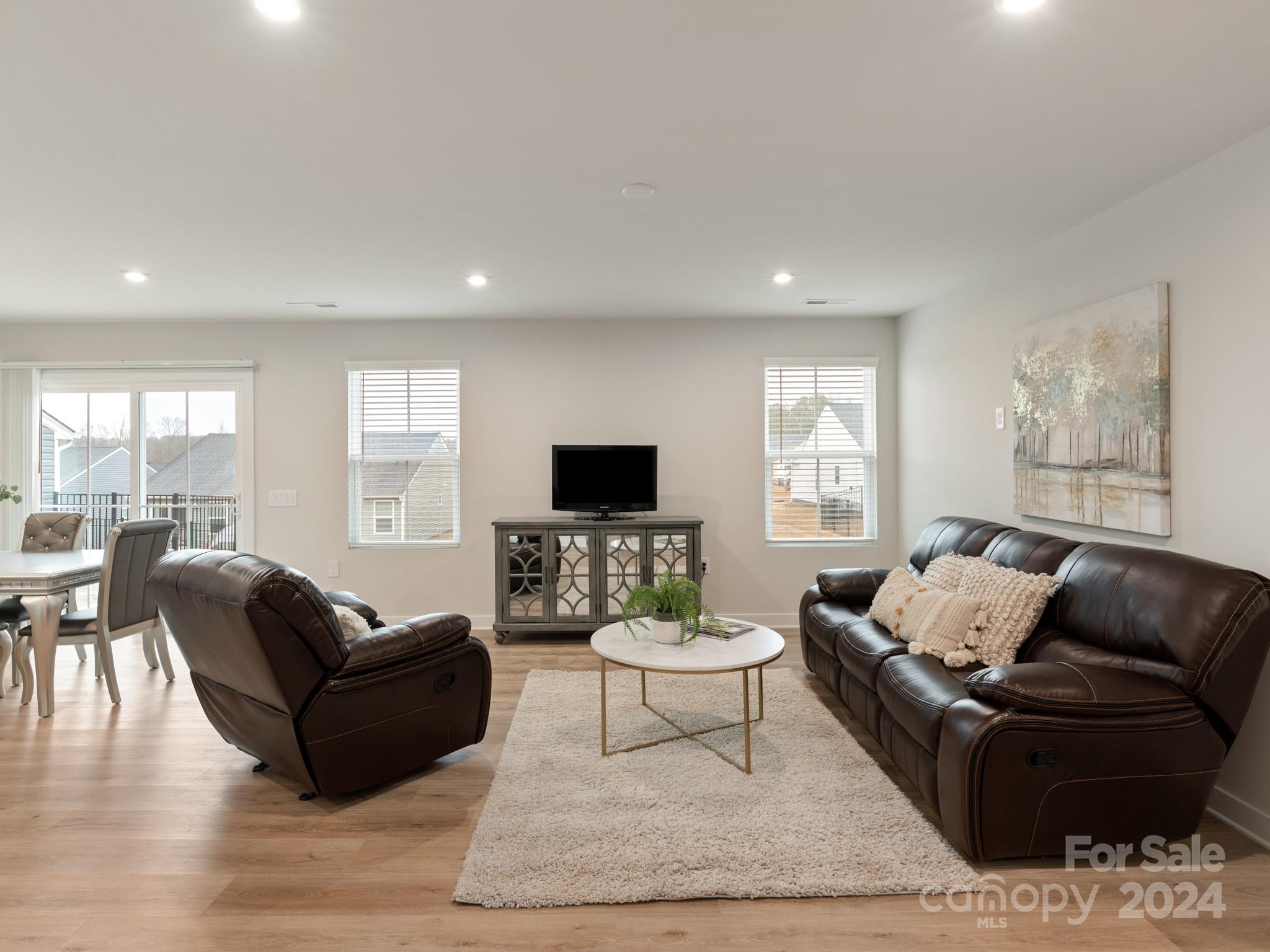 309 Damask Drive Lancaster, SC 29720 - Photo 10 of 28 a living room with furniture or couch and a flat screen tv