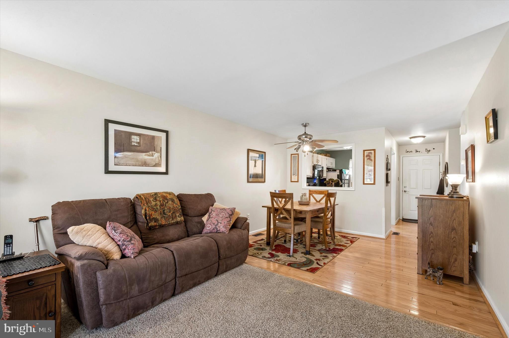 270 Miley Road, Unit 270 Aston, PA 19014 - Photo 13 of 25 Living Room Into Kitchen