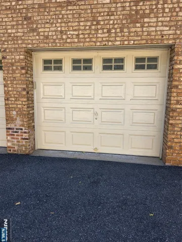 a view of a house with a gate