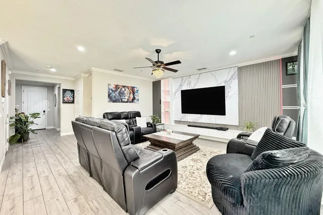 a bedroom with a bed lamp and a window