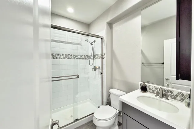 a view of entryway and hall with a front door