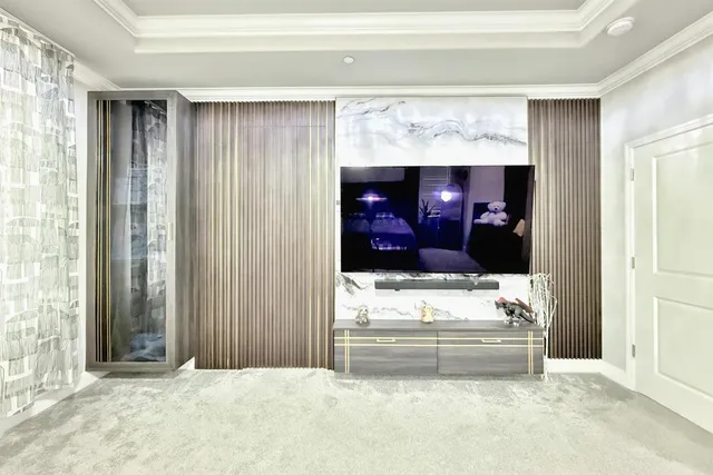 a view of a hallway view with wooden floor and furniture