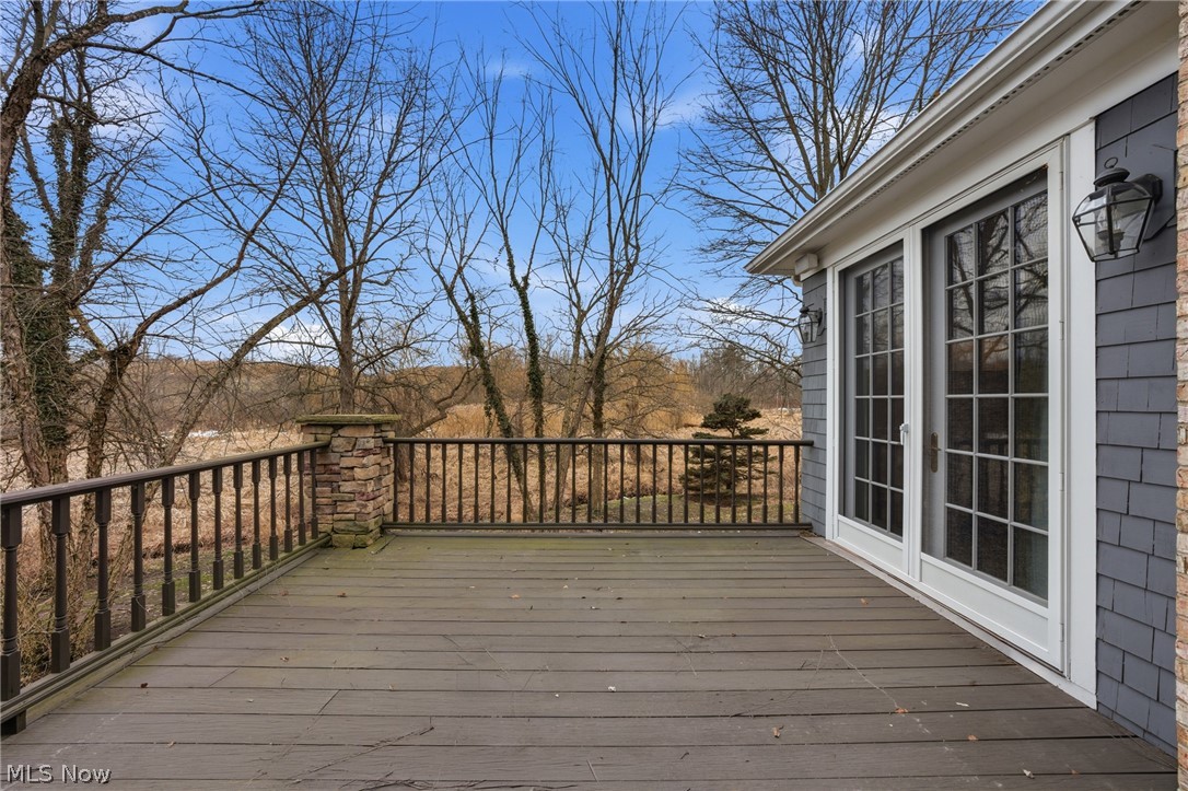 31900 Pinetree Road Pepper Pike, OH 44124 - Photo 40 of 43 Take in the natural landscape from the deck off the family room and living room.