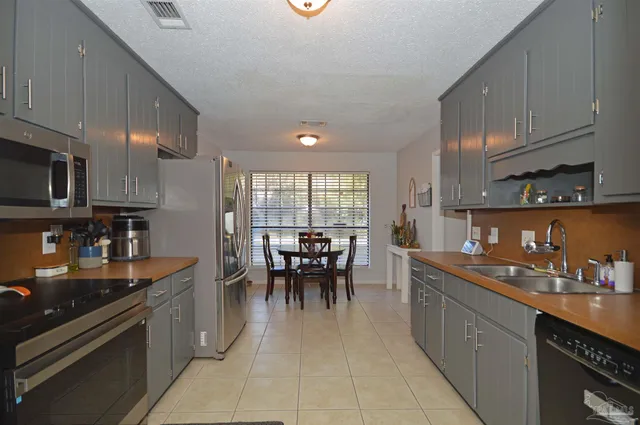 a view of storage and utility room with washer and dryer