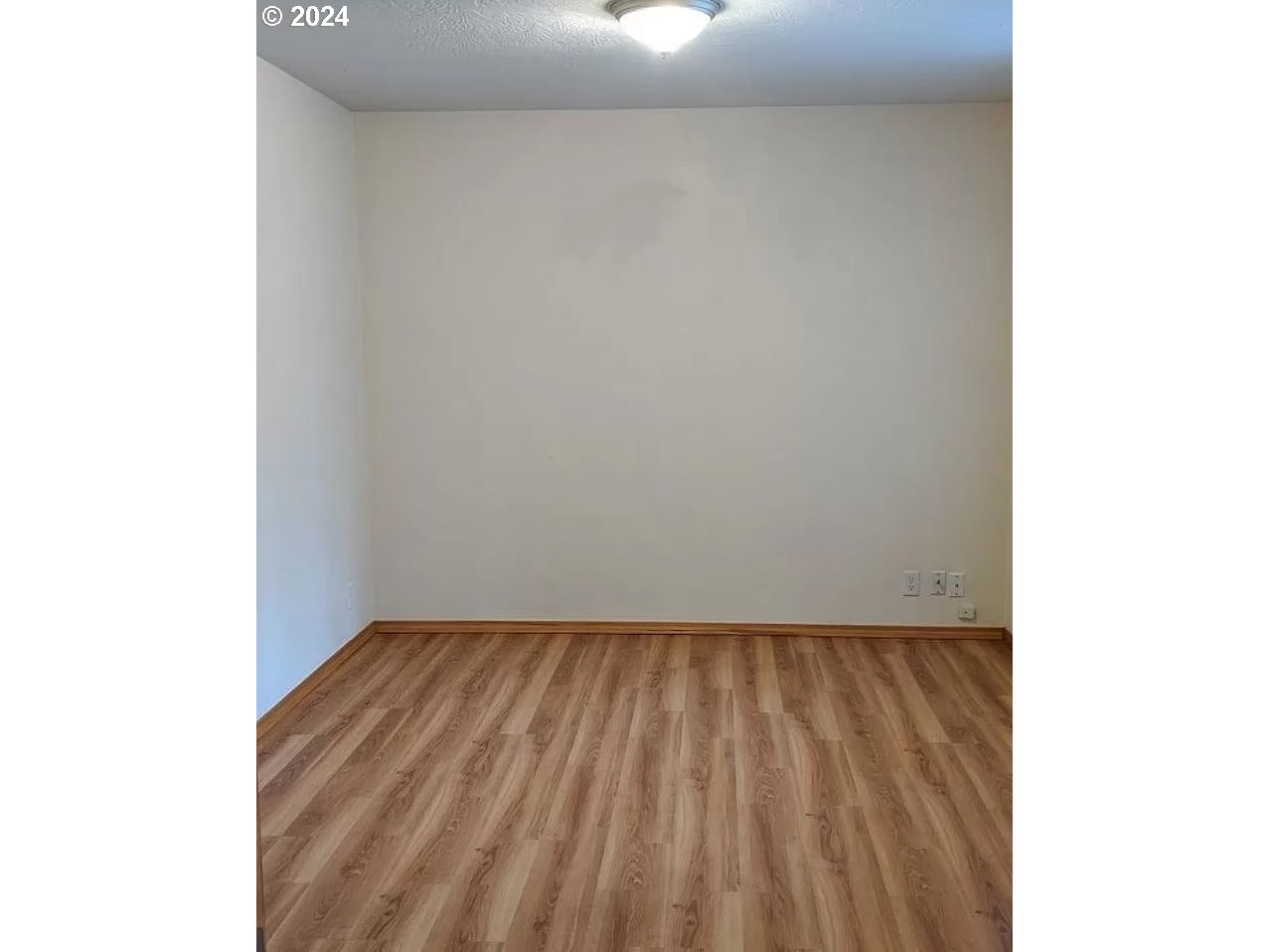 537 Nicholas Drive Springfield, OR 97477 - Photo 11 of 37 a view of a room with wooden floor and a window