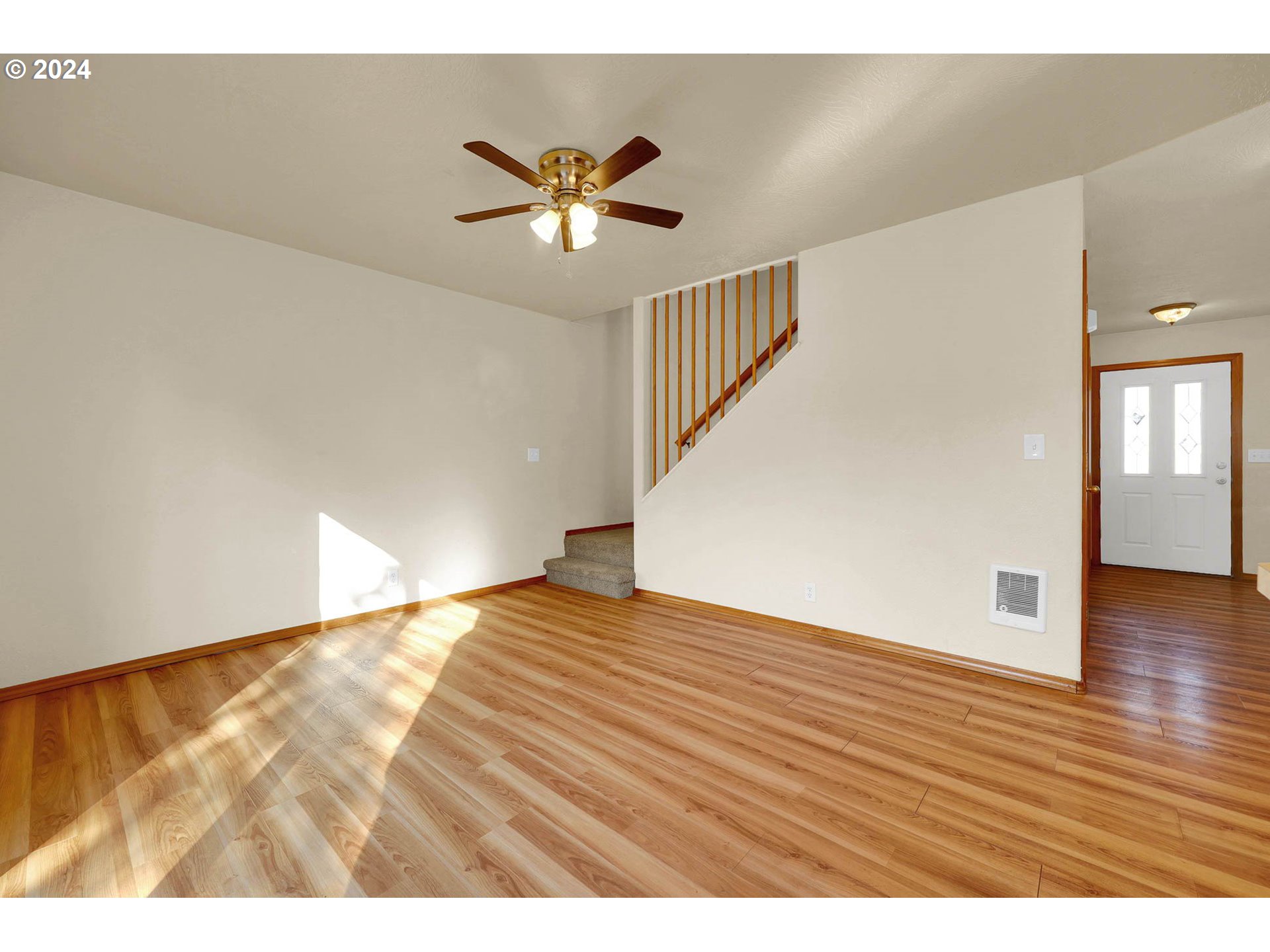 537 Nicholas Drive Springfield, OR 97477 - Photo 18 of 37 a view of an empty room with wooden floor and closet