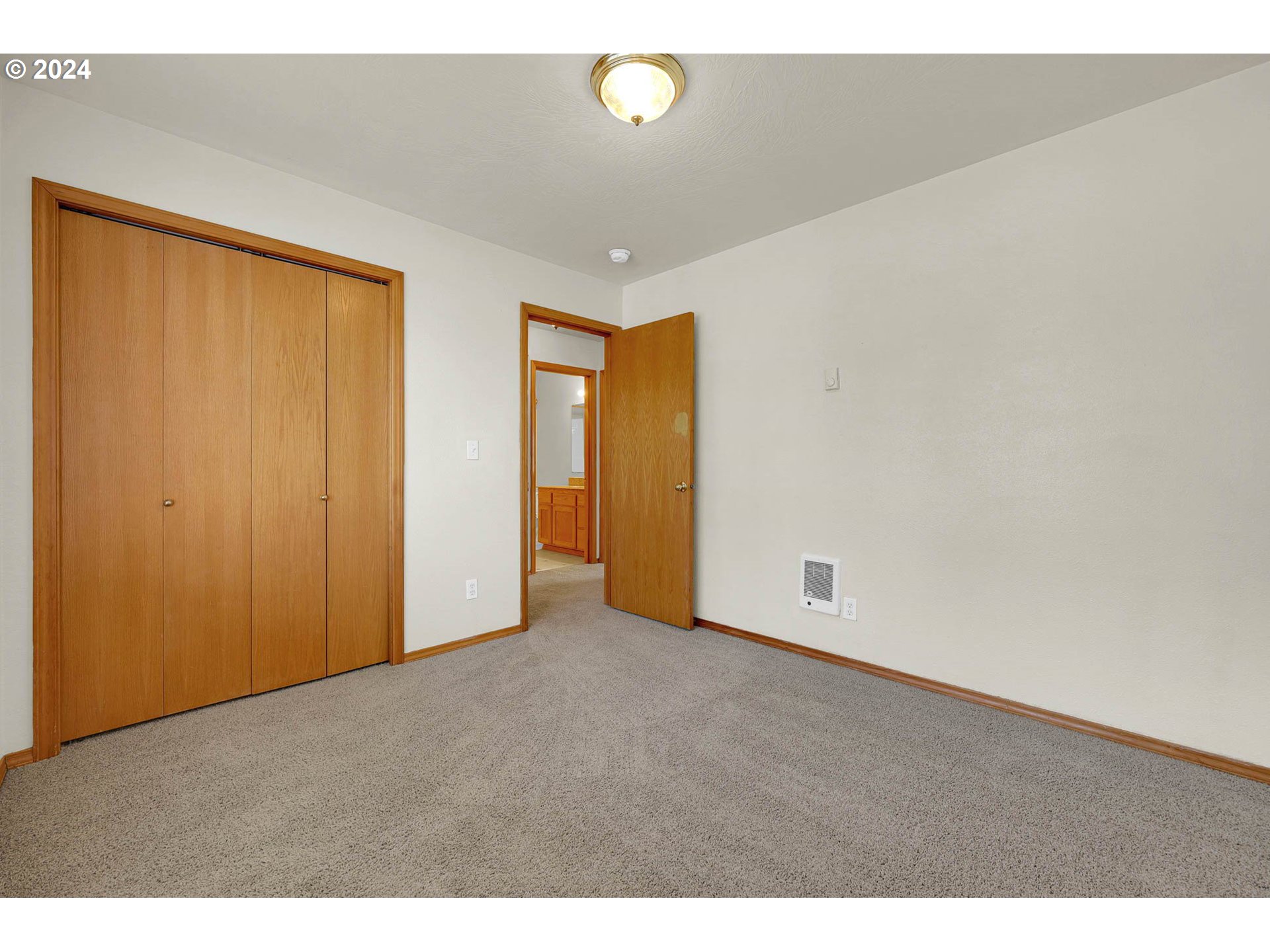 537 Nicholas Drive Springfield, OR 97477 - Photo 22 of 37 a view of empty room with wooden floor