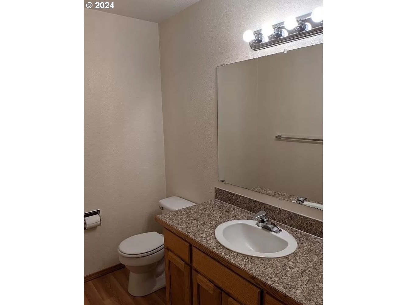 537 Nicholas Drive Springfield, OR 97477 - Photo 4 of 37 a bathroom with a granite countertop sink toilet and a mirror