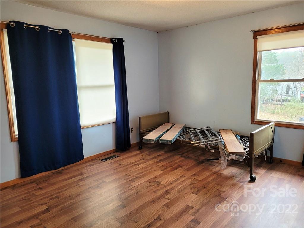 941 Engineer Road Bostic, NC 28018 - Photo 13 of 29 a bedroom with a bed and a window